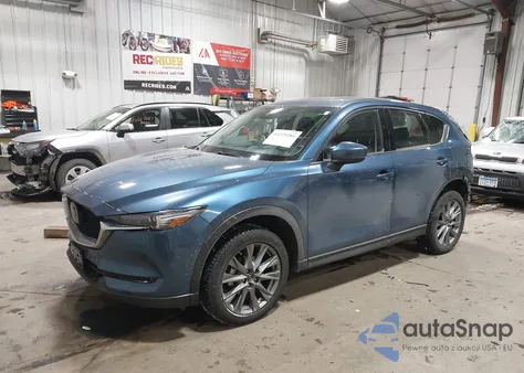 2021 Mazda Cx-5 Grand Touring z USA, uszkodzony, nr VIN JM3KFBDM3M1405602